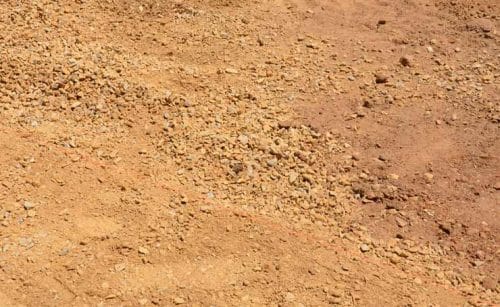Spread out 50mm of Quarry Rubble