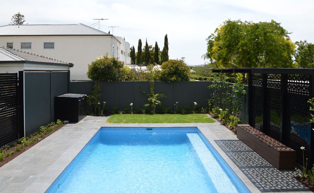 After Paving and Landscaping Concrete Pool After Landscaping
