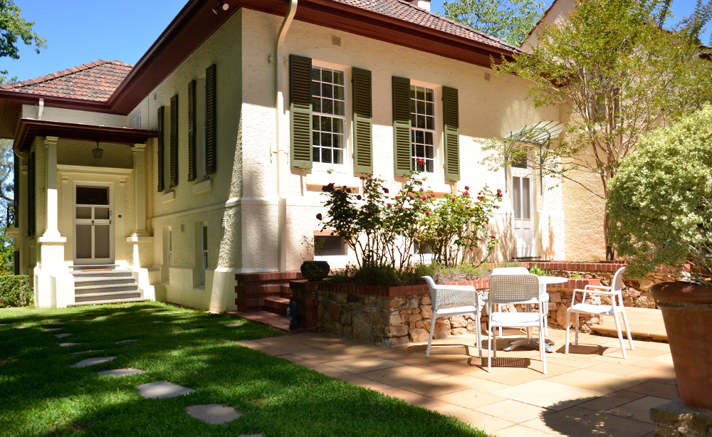 Paved Area bordered by garden beds